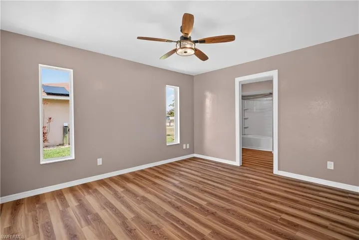 Primary Bedroom with view of bathroom