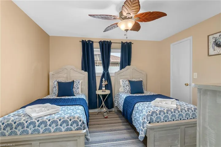 Bedroom featuring a ceiling fan