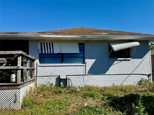 View of property exterior featuring stucco siding