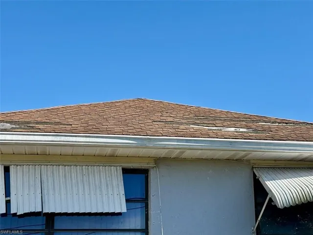 Exterior view of roof with shingles
