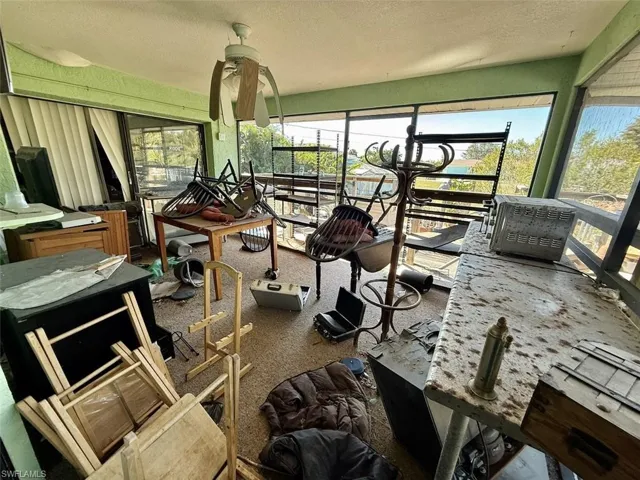 Miscellaneous room featuring a textured ceiling