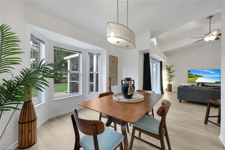 dining room with bay window