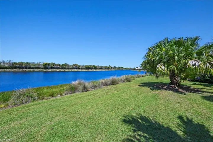 Expansive waterfront property featuring a wide waterway