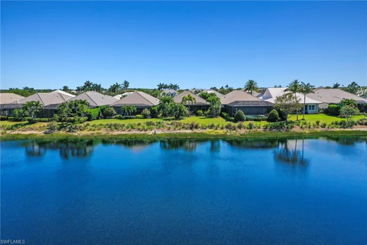 Expansive water feature with multiple single-story residences