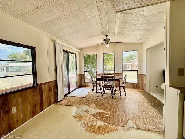 Dining space featuring vaulted ceiling and ceiling fan