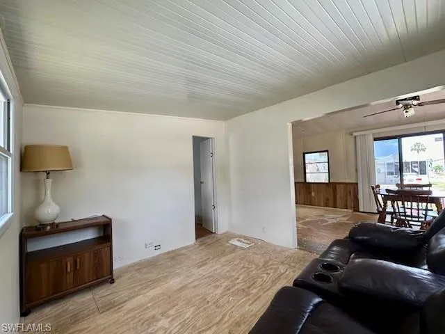 Living room featuring wood ceiling