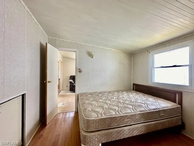 Bedroom featuring hardwood / wood-style flooring