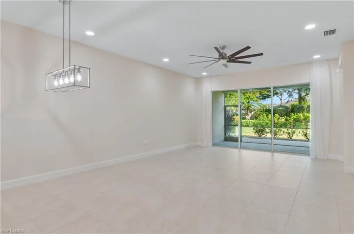 Great Room with lighting and ceiling fan