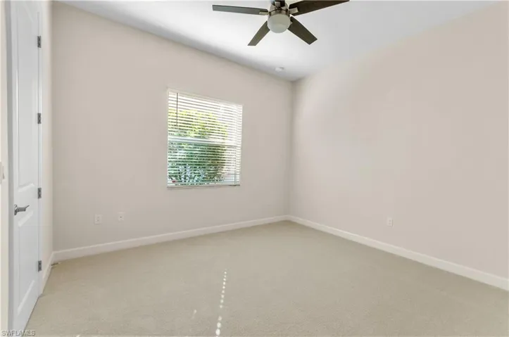 Second Bedroom with new carpet and ceiling fan