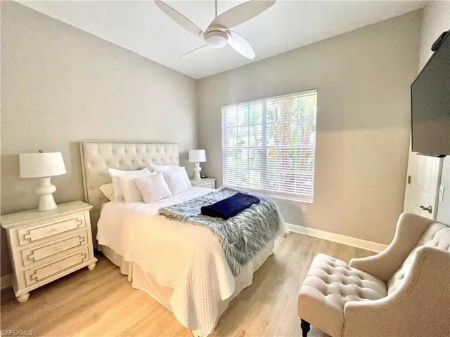 Bedroom featuring light wood-style floors and a ceiling fan