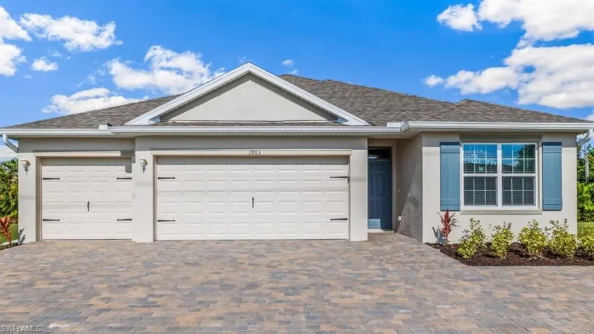 Model home. Ranch-style home featuring stucco siding, driveway, an attached garage, and roof with shingles