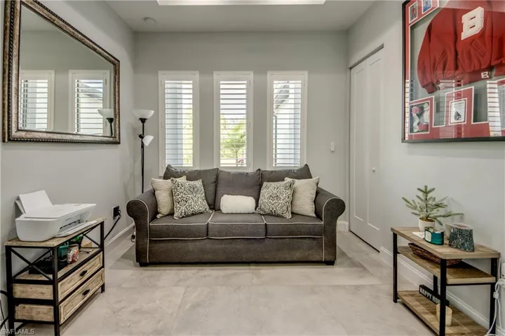Living room featuring baseboards