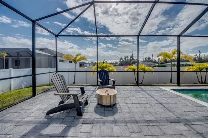 View of patio / terrace featuring a sunroom and a lanai