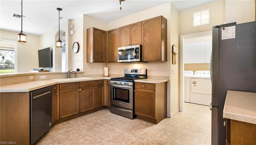 Laundry located right off the kitchen