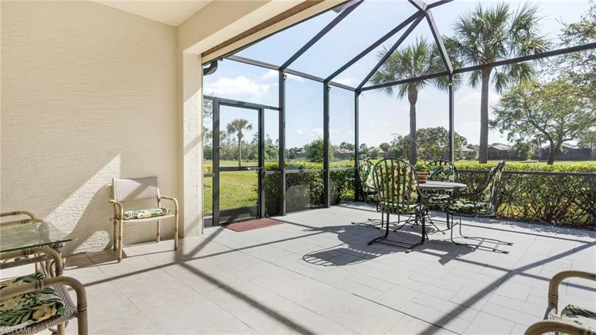 expansive tiled lanai with Storm Smart drop-down shutters