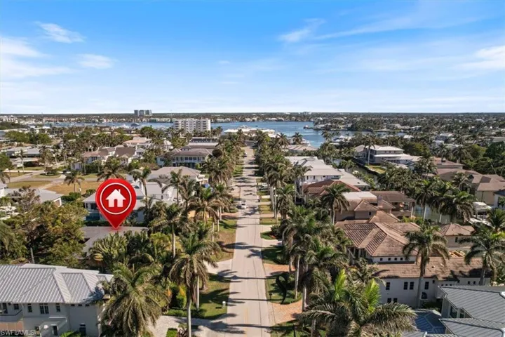 One block to the Naples Yacht Club.