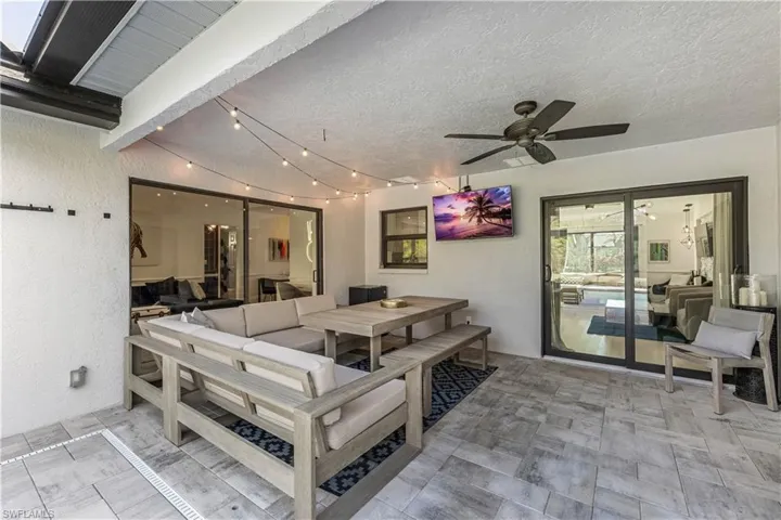 View of patio / terrace featuring ceiling fan and an outdoor hangout area