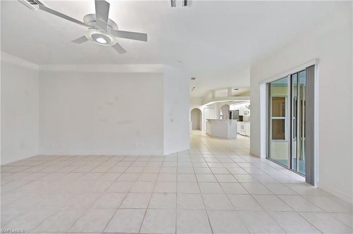 Family room with view of the lanai and canal