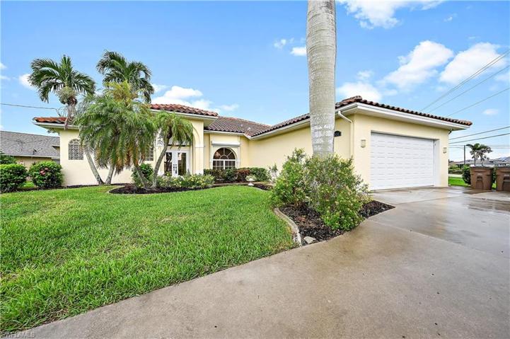 Lush mature landscaping surround this home