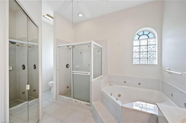 Master bath with double sinks, soaking tub and separate shower