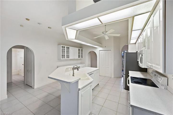 From the family room, looking at the breakfast area and kitchen