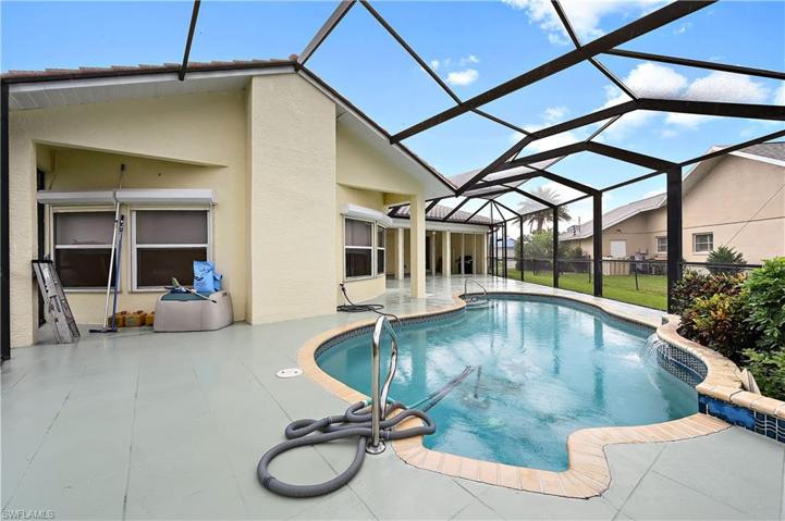 Pool with planter and waterfall