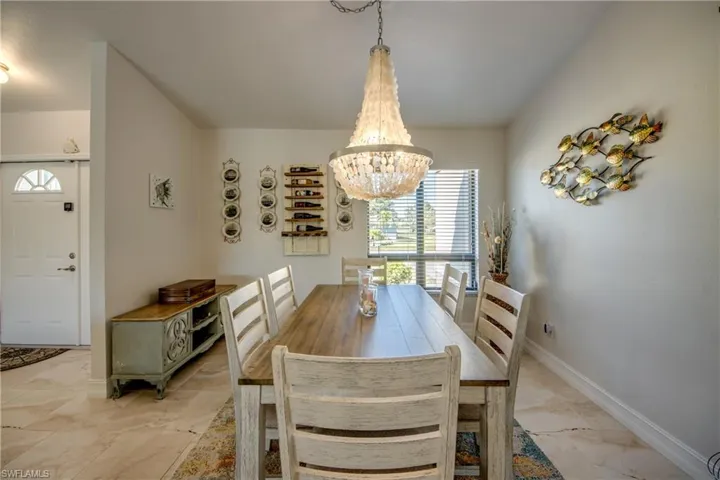 Dining area with a chandelier