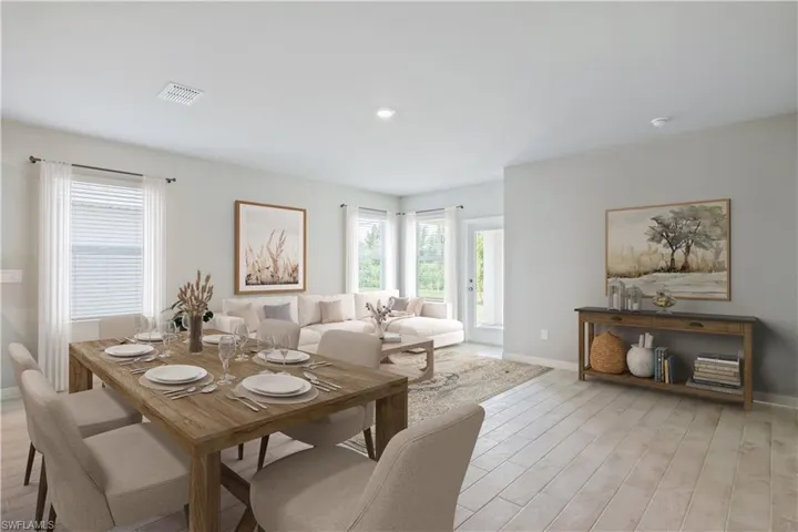 Dining room featuring light wood-type flooring