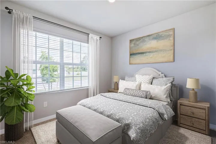 Bedroom with carpet flooring