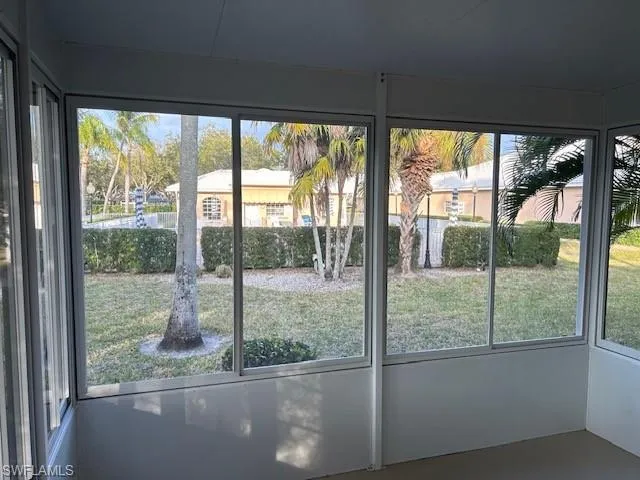 Unfurnished sunroom featuring healthy amount of natural light