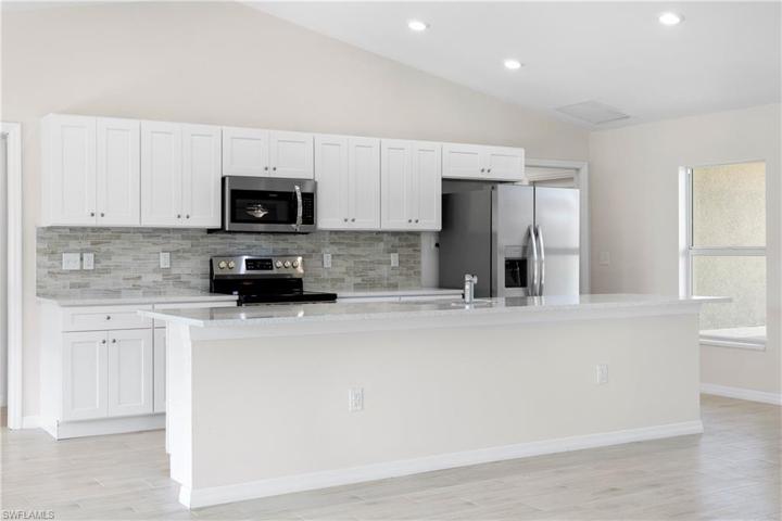 photos are of a different home, but same model