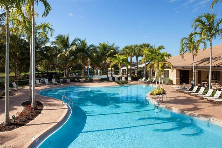 Resort style pool adjacent to kids pool. area.