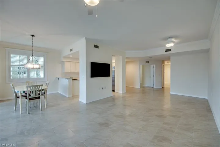 Living Room overlooking Dining area and Kitchen