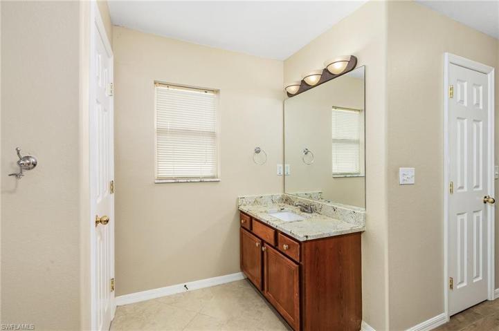 Master bath with dual vanities granite counters