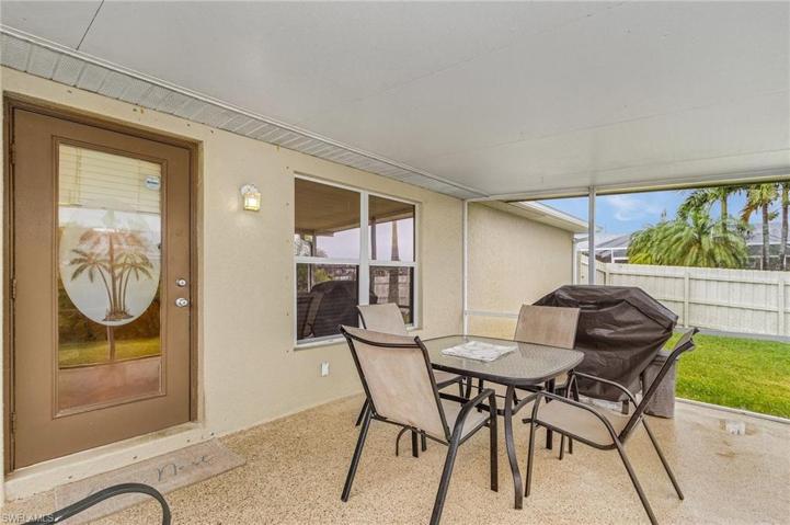 Screened in Lanai overlooking fenced in back yard