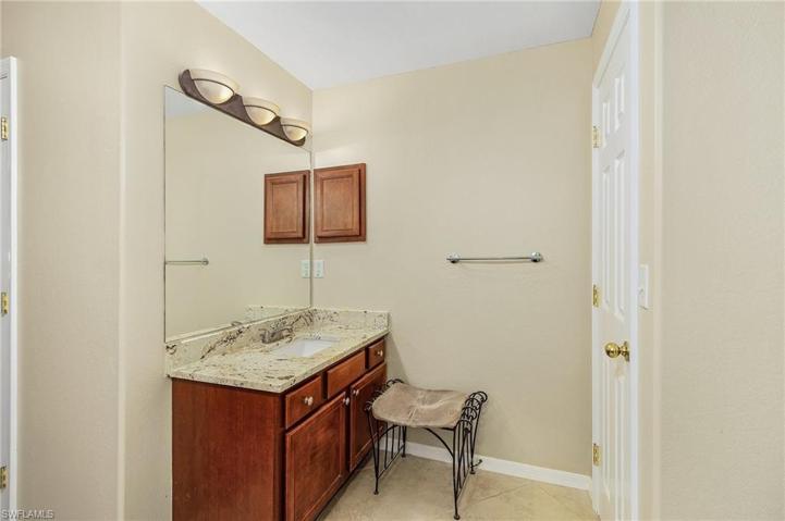 Master bath with dual vanities granite counters