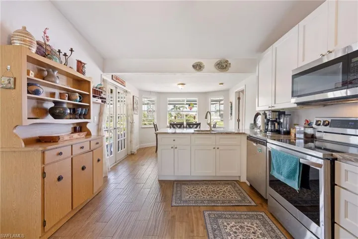 Stainless Steel Appliances Kitchen sink overlooking back