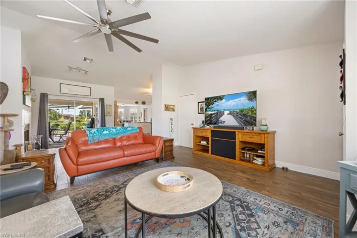 Living room with TV and Fan