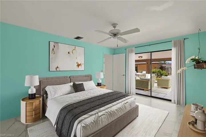Virtually staged, Bedroom featuring visible vents, a ceiling fan, and access to outside