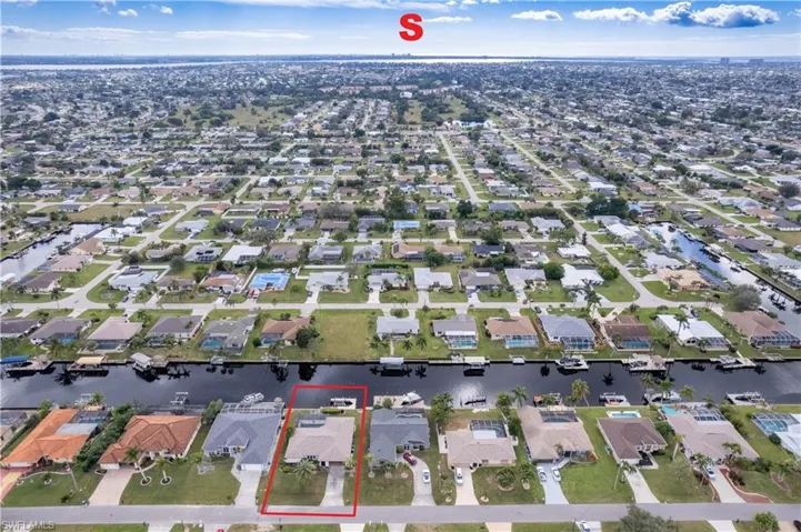 Aerial perspective of a residential canal-front property