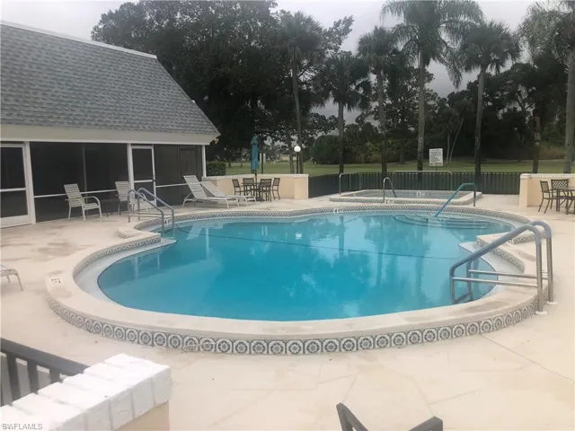 View of community pool and spa at clubhouse