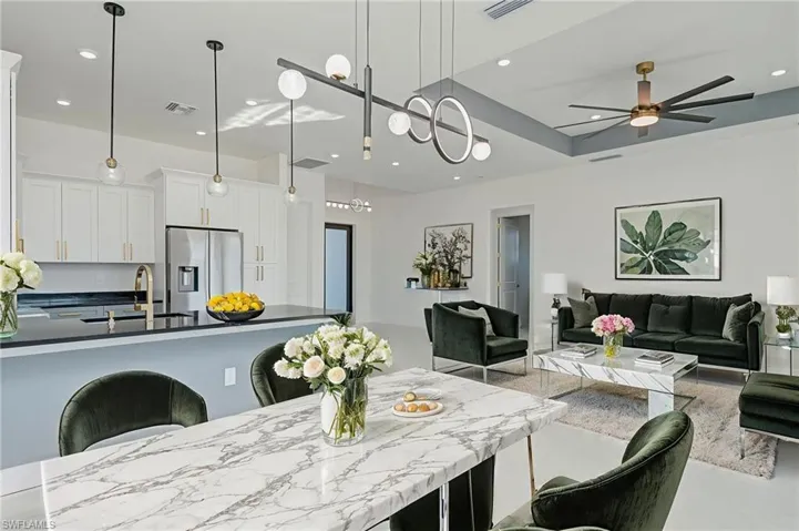 Dining area featuring recessed lighting and ceiling fan