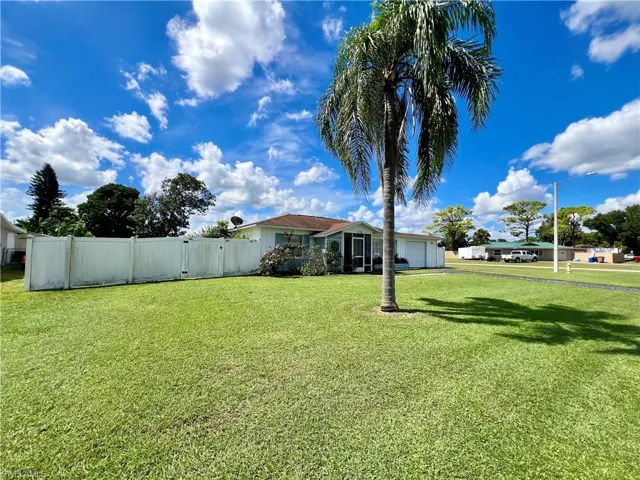 View of yard featuring a garage