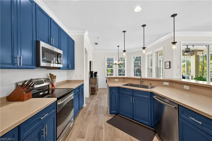 Spacious kitchen with pendant lighting