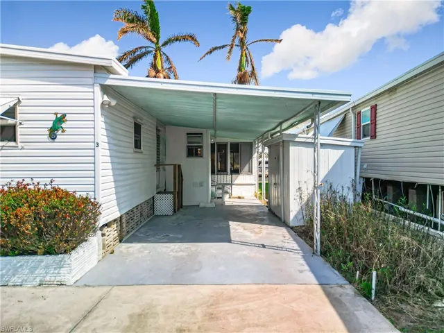 Carport and storage shed