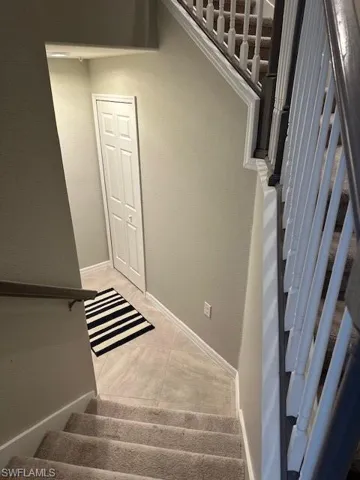 View of stairs from above living area