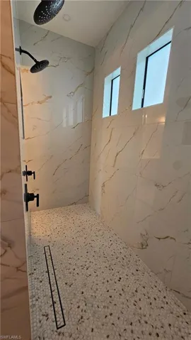 Dual shower heads with a marble-like finish