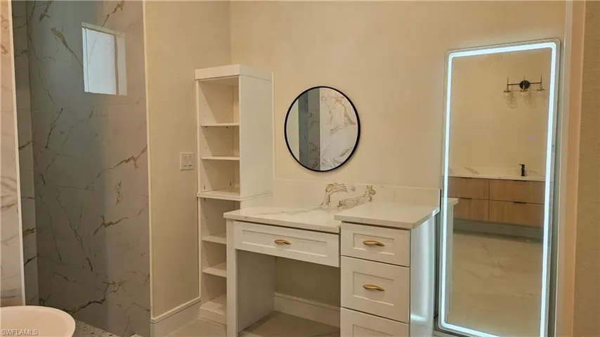 Main bath vanity and frameless LED lighted full body mirror