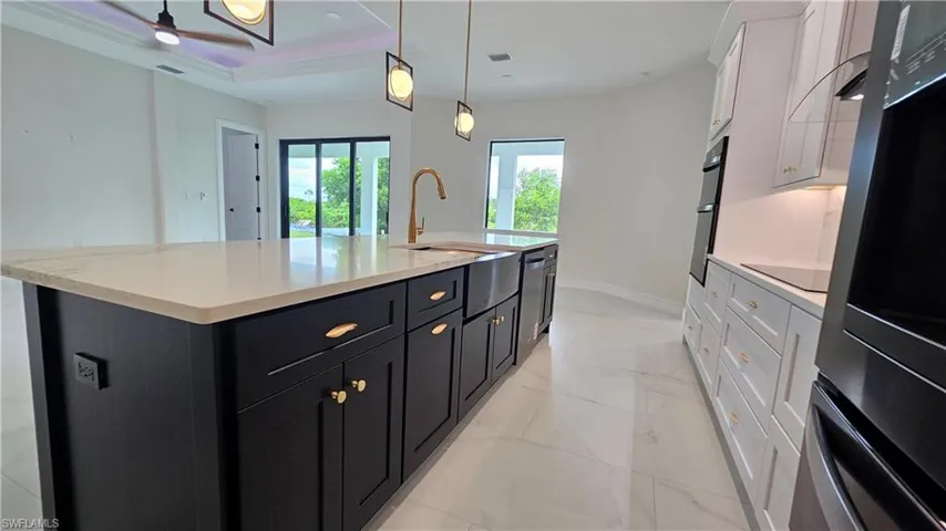 Island with black cabinets
