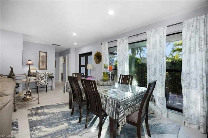 Dining area featuring recessed lighting and french doors
